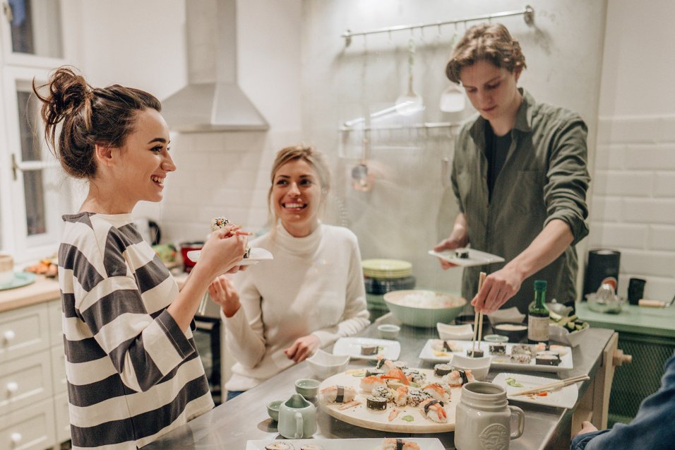 Friends enjoying sushi